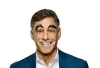 a man in a suit has a green mask on his face with dollar signs in his eyes
