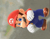 a close up of a mario cartoon character