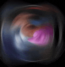 a blurry picture of a person 's face in a dark circle