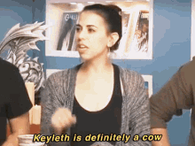 a woman says " keyleth is definitely a cow " in a room