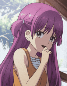 a girl with purple hair is wearing a tank top and smiling