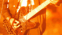 Strumming Guitar Brompton Jackson GIF - Strumming Guitar Brompton Jackson Action Adventure GIFs