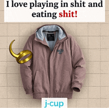 a picture of a jacket with the words " i love playing in shit and eating shit " on it