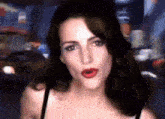 a close up of a woman with red lips