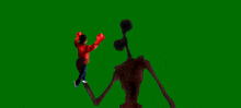a boy in a red sweater is standing next to a monster with a siren head on a green screen .