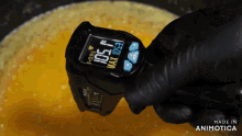 a person holding a digital thermometer that reads 105 degrees celsius