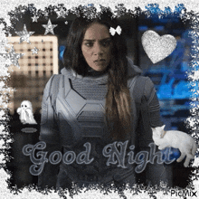 a picture of a woman in a space suit with the words good night written on it