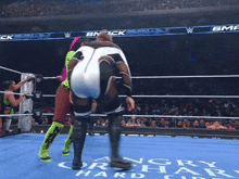 a wrestling match is taking place in front of a smack down sign