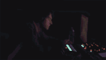 a man wearing headphones is playing a video game