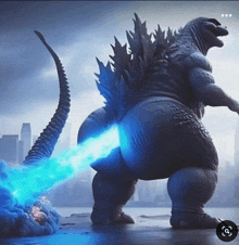 a statue of a monster with a blue flame coming out of its tail .