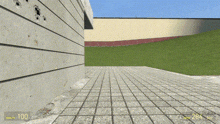 a video game shows a black and white cat jumping over a brick wall