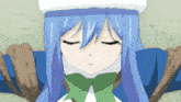 a girl with blue hair and a green bow tie is laying down