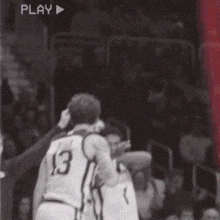 a basketball player with the number 13 on his back