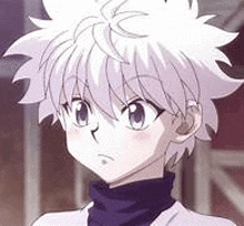 a close up of a person with white hair wearing a turtleneck and a white shirt .