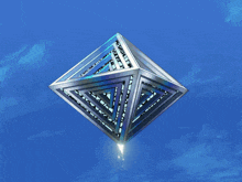 an optical illusion of a pyramid with a blue sky behind it