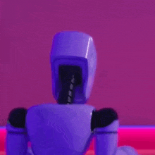 a purple robot is standing in front of a purple wall .