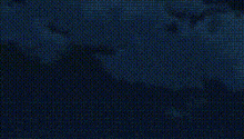 a close up of a person 's face with a blurred background and a few dots on it .