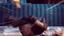 a close up of a person laying on the floor with the words clideo.com visible in the corner .