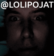 a close up of a person 's face with the words @lolipojat behind it