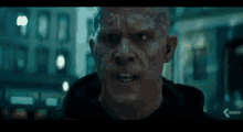 a close up of a man 's face in a movie scene