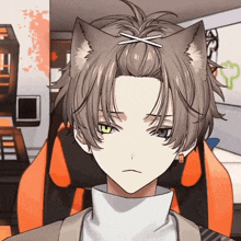 a boy with a cat ear on his head is sitting in a chair