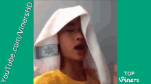 a video of a person with a towel on their head and the words youtube.com/vinershd on the bottom
