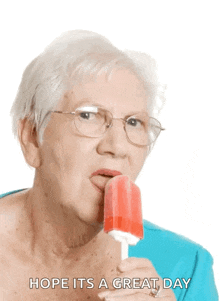 an elderly woman is licking a popsicle with the words hope it 's a great day behind her