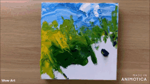 a painting on a canvas with the words wow art below it