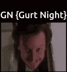 a man in a suit and tie is standing in front of a door with the words gn ( gurt night ) on the bottom