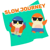 two penguins are laying on a towel with the words slow journey written above them
