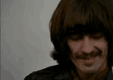 George Harrison Smiling On Guitar GIF - George Harrison Smiling On Guitar George Harrison Smiling George Harrison GIFs