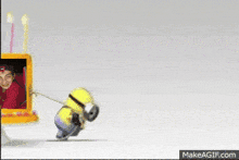 a minion pulling a rope with a picture of a boy behind it