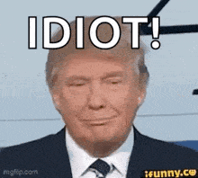 donald trump is wearing a suit and tie and smiling with the words idiot !