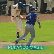 a baseball player with the number 21 on his jersey is being chased by another player