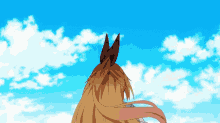 a girl with long blonde hair stands in front of a blue sky with clouds