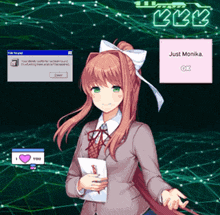 a girl is holding a piece of paper in front of a computer screen that says just monika ok