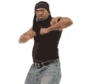 a man in a black tank top and jeans is dancing with his arms outstretched on a white background .