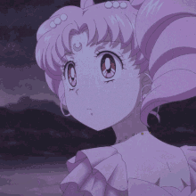 a cartoon girl with pink hair and a crescent moon on her head