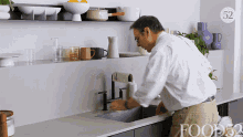 Wiping Countertop Food52 GIF - Wiping Countertop Food52 Cleaning GIFs