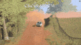 a white car is driving down a dirt road in a video game called dirt rally 20