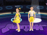 a boy and a girl are standing in front of a purple audition sign