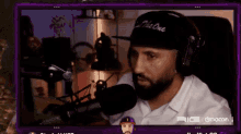 a man wearing a hat that says " call the one "