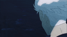 a close up of a person 's face with a blue haircut