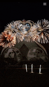 a fireworks display with a heart in the middle and the caption capcut