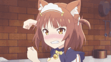 a girl with cat ears and a bell around her neck looks angry