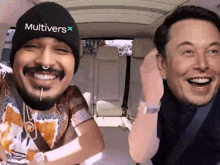 elon musk and a man with a beard wearing a hat that says multivers
