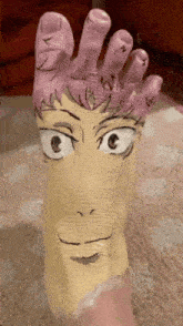 a person 's foot has been painted to look like a cartoon character