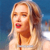 a blonde woman with a surprised look on her face says i lamp you !