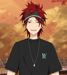 a boy with red hair wearing a ny t-shirt