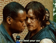 two men are standing next to each other and one of them is saying i will beat your ass